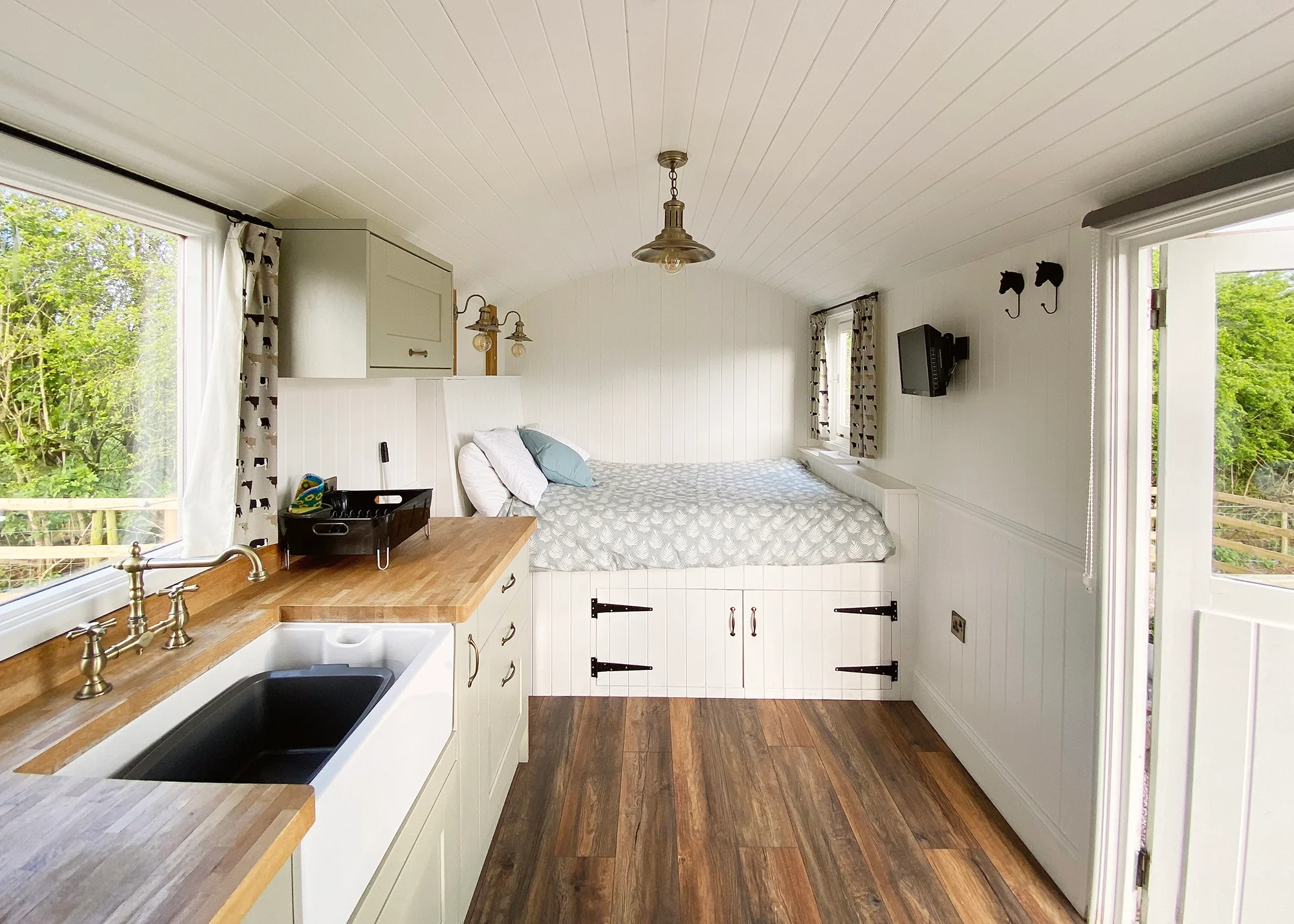 Shepherd's Hut bedroom at Inkersall Grange farm and Inkersall Cabins